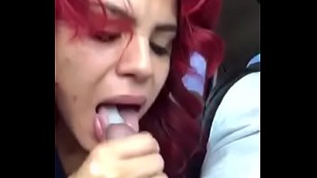red head Latina swallows cum
