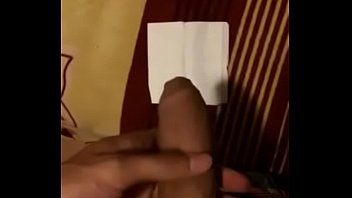 Young man masturbates and ends up on a napkin.