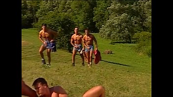 Yummy muscled hunks pumping each others holes under the sun