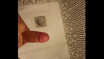 Hairy dude jerking off at shower