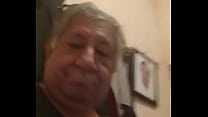 Old man touching himself on video call