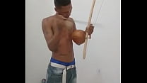 Do you want to play my berimbau? NovinNovinho playing capoeira instrument