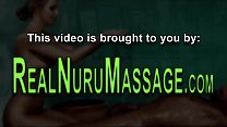 Ebony masseuse massages in nuru gel