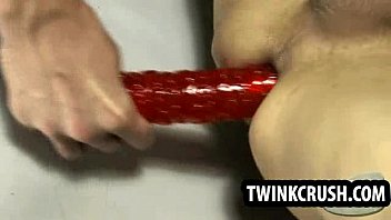 Horny tied up twink taking a toy in his tight ass