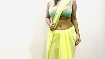 Bande-annonce - Bhabhi indienne aux gros seins séduit en sari jaune
