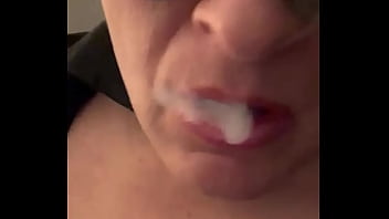 CD Nikki up close smoking with pink lipstick