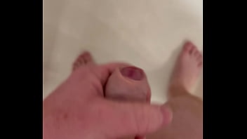 Masterbating in the shower while wife talks to her friend in next room..