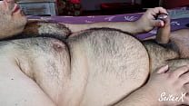 Hairy fat guy squirts a lot of cum
