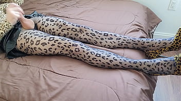 Crossdresser jerking off in leopard print pantyhose and heels