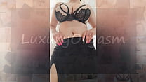 Busty beauty in black skirt and sexy bra dances in front of the camera - LuxuryOrgasm