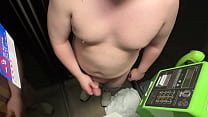 Shaved fat man flashes his ejaculation on a public phone