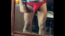 young chubby guy with a hard dick in his underwear